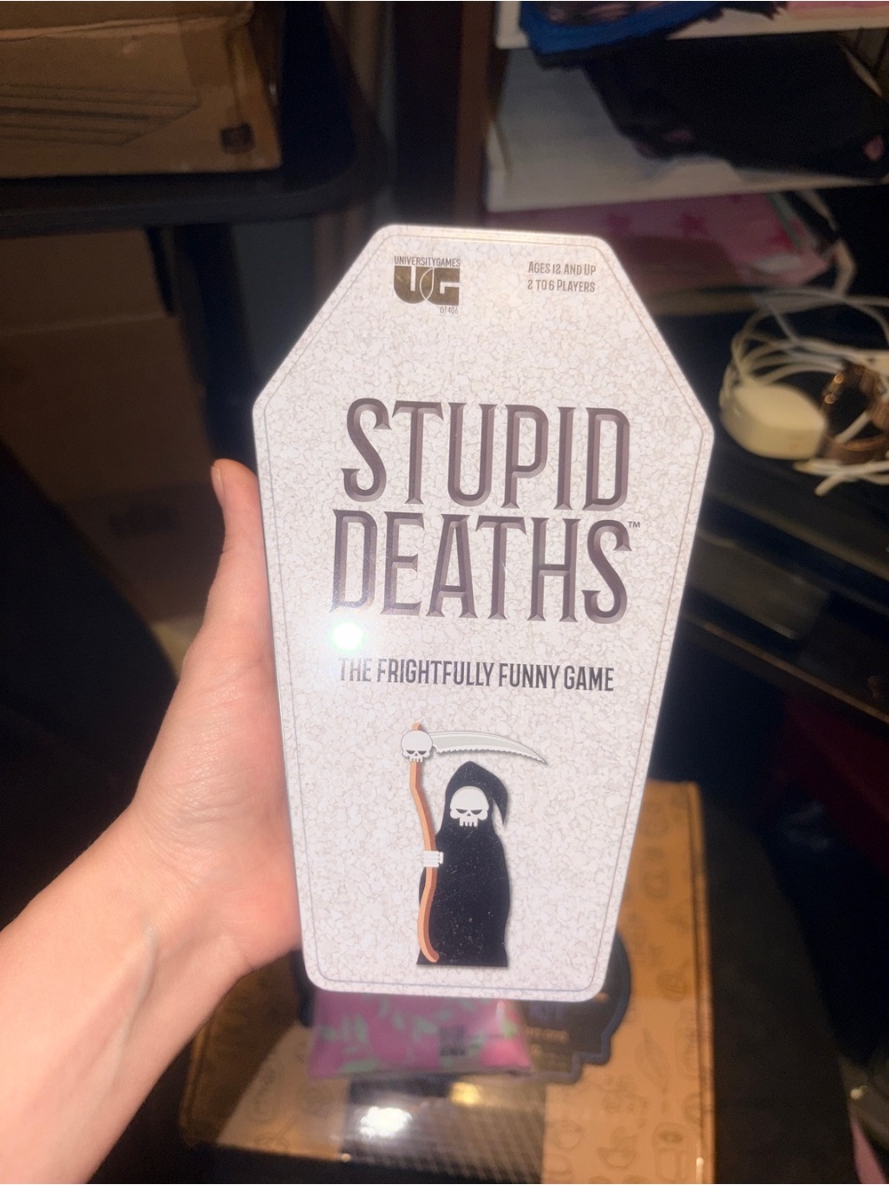 Source Unknown Stupid Deaths Card Game - White and Black Coffin Box